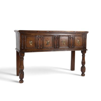 an image of a wooden table with three drawers on top of it