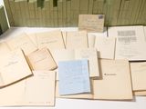 many open books sitting on a table next to each other