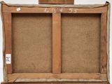 an old wooden easel with a piece of cardboard on top of it