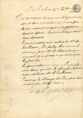 lettre manuscrite écrite à l'encre noire sur une feuille de papier