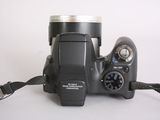 a black camera with a strap attached to it