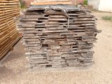 a pile of wood stacked on top of each other