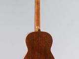 an image of a guitar hanging from the ceiling