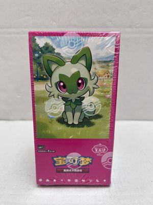 a close up of a box of pokemon cards on a table