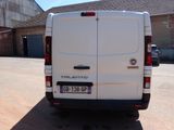 a white van that is parked in a parking lot