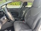 the interior of a car with black leather seats and black trims