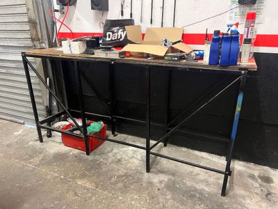 Table haute d'atelier noire plateau bois