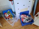 a refrigerator and a freezer in a room with christmas decorations