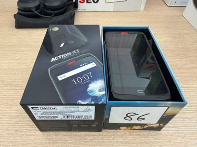 packaging of a box with a phone inside of it on a table
