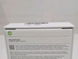 the back of a white box with a green logo on it