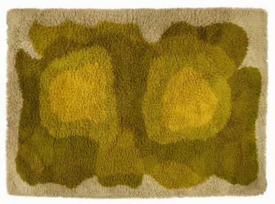 tapis jaune et marron orné de deux citrons sur fond blanc