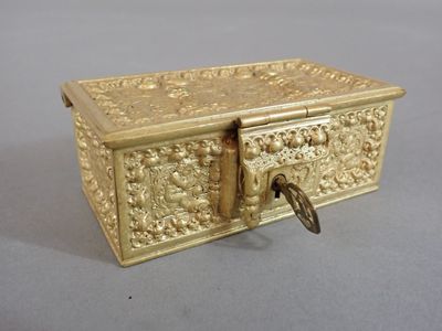 an image of a gold box with a lock on it