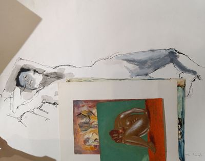 a drawing of a man laying on a bed next to a painting