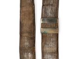 an old belt with a metal buckle on a white background