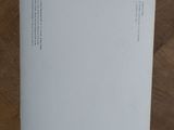 an image of a piece of paper sitting on top of a wooden floor