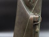 an image of a statue of a man holding a sword