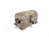 silver metal jewelry box with ornate design on a white background