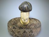 a statue of a man with a hat on his head