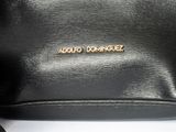 an image of a black purse with a gold logo on it