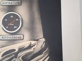 a black and white photo of a speedometer and gauges