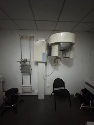 a room with a chair and a table in it
