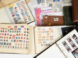 many different types of stamps on the pages of a book