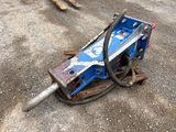 a blue machine that is sitting on the ground