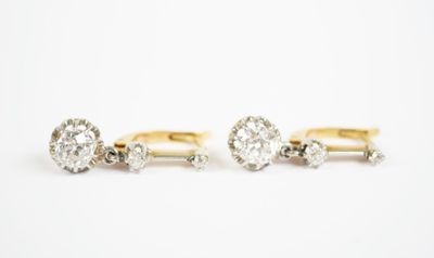 a pair of diamond and gold cufflinks