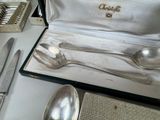a silverware set in a box on a table