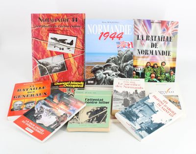 several books on a white table with a white background