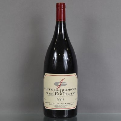 a bottle of wine that is sitting on a table
