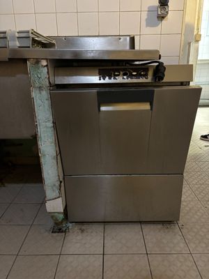 an image of a kitchen with a stove and a dishwasher