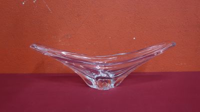 a glass bowl that is sitting on a table