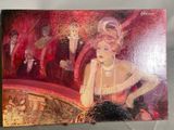 painting of a woman in a red dress sitting in front of a stage