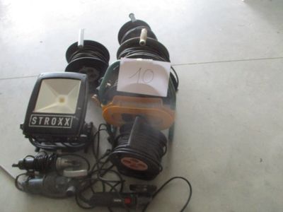 a lot of different types of electronic equipment on the floor