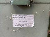 a close up of a metal box with a sticker on it