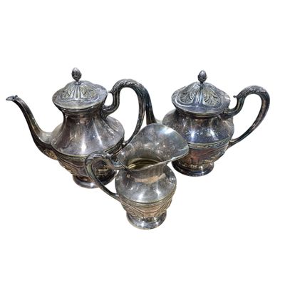 silver plated teapots and coffee pots on a white background