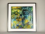 painting of a painting of water lilies in a white frame on a wall