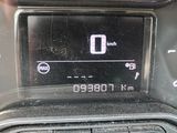 a close up of a car dashboard with a clock on it