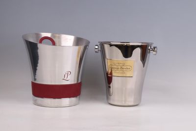 two buckets that are sitting next to each other on a table