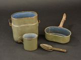 a green container with a wooden spoon and a green container with a wooden spoon and a green container with a wooden spoon and a green container with a wooden