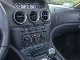 a car dashboard with various gauges and controls in it