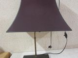 a lamp that is sitting on a white table