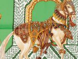 a picture of a painting of a horse on a green background