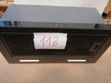 a black microwave oven with a sign on the front of it