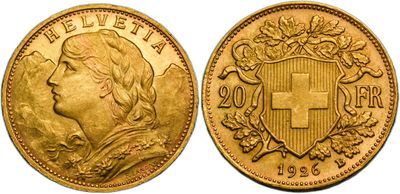 a gold coin with a cross on the front and a cross on the back