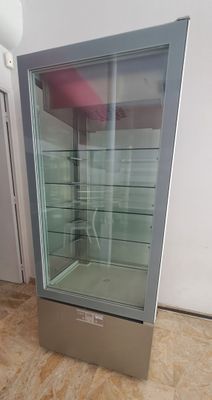 an image of a glass display case in a room