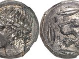 a silver coin with an image of a man and a woman on it