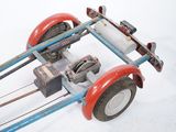 a toy car that is sitting on a white surface