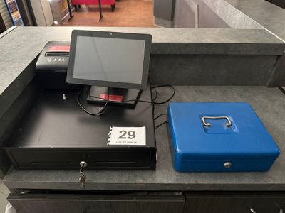 une image représentant une caisse enregistreuse équipée d'un écran et d'un boîtier bleu